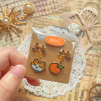 OP Charm Earring & Brooch