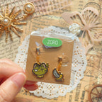 OP Charm Earring & Brooch